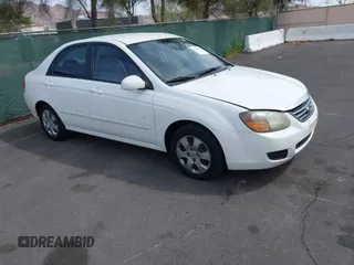 2009 Kia Spectra EX with VIN KNAFE221795630995, listed as a IAAI auction lot 41928252 with 126,694 mi miles. Bid and sale history available at carsss.com. Image 1.