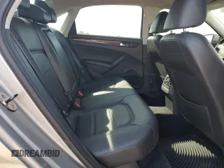 2014 Volkswagen Passat SE z VIN 1VWBT7A3XEC038811, wystawiony jako Copart lot #55198795 z przebiegiem 119 497 mil mil oraz Szkoda całkowita • Salvage title. Historia ofert i sprzedaży dostępna na DreamBid. Obrazek 10.