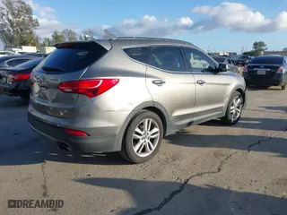 2014 Hyundai Santa Fe Sport with VIN 5XYZU3LA8EG185627, listed as a IAAI auction lot 41592463 with NaN miles. Bid and sale history available at carsss.com. Image 4.