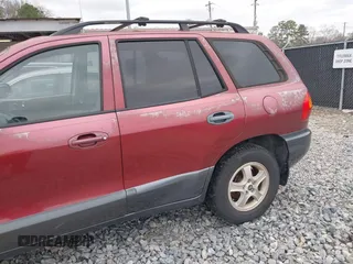 2002 Hyundai Santa Fe GLS with VIN KM8SC73D72U306997, listed as a IAAI auction lot 41519773 with 244,398 mi miles. Bid and sale history available at carsss.com. Image 14.