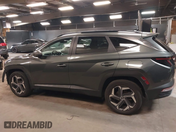 2022 Hyundai Tucson SEL Convenience with VIN KM8JFCA11NU080691, listed as a IAAI auction lot 42106350 with 81,477 mi miles and . Bid and sale history available at carsss.com. Image 15.