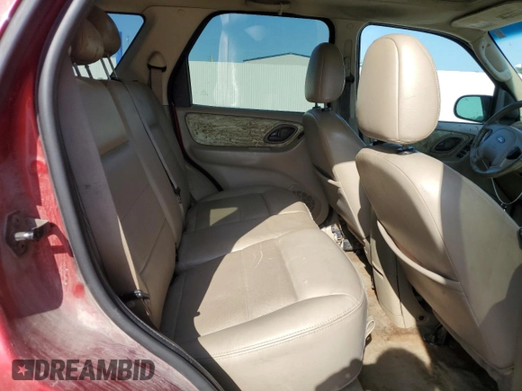 2006 Ford Escape Limited with VIN 1FMYU04116KA40963, listed as a Copart auction lot 61600525 with 208,696 mi miles and Salvage title. Bid and sale history available at DreamBid. Image 11.