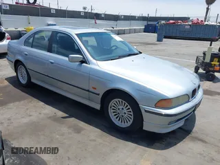 1997 BMW 5 Series 540i z VIN WBADE6324VBW51871, wystawiony jako IAAI lot #42505762 z przebiegiem 106 130 mil mil oraz . Historia ofert i sprzedaży dostępna na DreamBid. Obrazek 1.