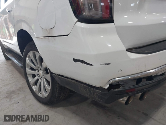2023 Chevrolet Tahoe Premier with VIN 1GNSKSKD0PR217513, listed as a IAAI auction lot 41779222 with 55,424 mi miles and . Bid and sale history available at DreamBid. Image 19.