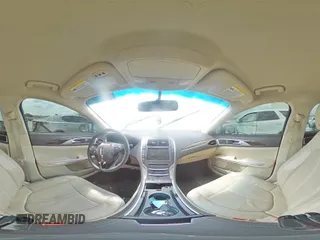 2014 Lincoln MKZ Hybrid z VIN 3LN6L2LU2ER816576, wystawiony jako Copart lot #57030235 z przebiegiem 221 863 mil mil oraz Szkoda całkowita • Salvage title. Historia ofert i sprzedaży dostępna na DreamBid. Obrazek 15.