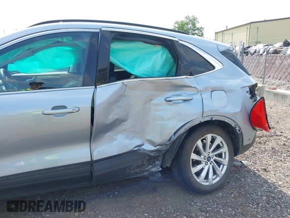 2022 Ford Escape Titanium with VIN 1FMCU9J94NUB57495, listed as a IAAI auction lot 42530044 with 27,075 mi miles and . Bid and sale history available at DreamBid. Image 6.
