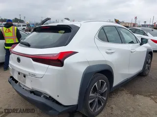2022 Lexus UX with VIN JTHX3JBH2N2052061, listed as a IAAI auction lot 41878323 with 36,902 mi miles. Bid and sale history available at carsss.com. Image 4.