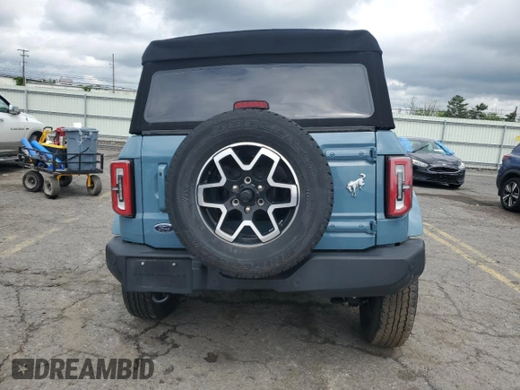 2023 Ford Bronco z VIN 1FMEE5DP9PLB17477, wystawiony jako Copart lot #58829615 z przebiegiem 22 069 mil mil oraz Szkoda całkowita • Salvage title. Historia ofert i sprzedaży dostępna na DreamBid. Obrazek 6.