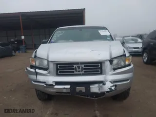 2006 Honda Ridgeline RTL with VIN 2HJYK16526H531190, listed as a IAAI auction lot 41450393 with 146,646 mi miles. Bid and sale history available at carsss.com. Image 12.