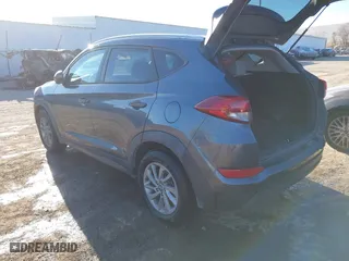 2016 Hyundai Tucson SE with VIN KM8J33A45GU089996, listed as a IAAI auction lot 41687069 with 129,957 mi miles. Bid and sale history available at carsss.com. Image 3.