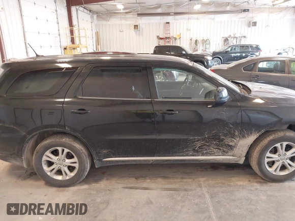 2013 Dodge Durango SXT with VIN 1C4RDJAG1DC681416, listed as a IAAI auction lot 42390313 with 222,022 mi miles and . Bid and sale history available at DreamBid. Image 13.