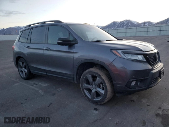 2021 Honda Passport Touring with VIN 5FNYF8H93MB006966, listed as a Copart auction lot 84738884 with 48,467 mi miles and Salvage Title. Bid and sale history available at carsss.com. Image 4.