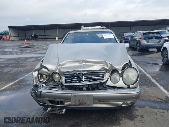 1997 Mercedes-Benz E-Class with VIN WDBJF55F3VA391335, listed as a IAAI auction lot 41606546 with 1 mi miles. Bid and sale history available at carsss.com. Image 13.