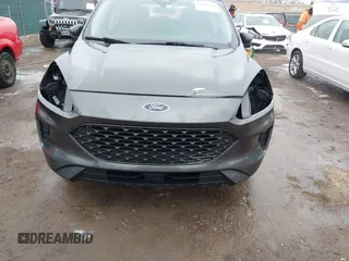 2020 Ford Escape S with VIN 1FMCU0F67LUC02565, listed as a IAAI auction lot 42012711 with 74,317 mi miles and . Bid and sale history available at carsss.com. Image 6.