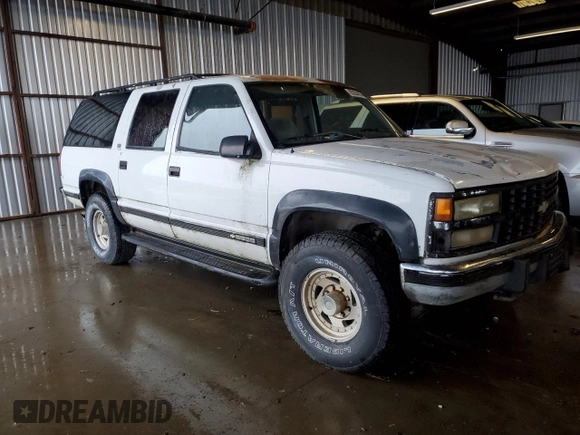1992 Chevrolet Suburban z VIN 1GNGK26K8NJ330202, wystawiony jako Copart lot #85204074 z przebiegiem 266 388 mil mil oraz Czysty tytuł • Clean title. Historia ofert i sprzedaży dostępna na DreamBid. Obrazek 4.