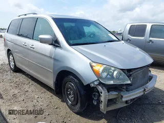 2008 Honda Odyssey EX-L with VIN 5FNRL38668B102716, listed as a IAAI auction lot 41908212 with 221,253 mi miles. Bid and sale history available at carsss.com. Image 1.