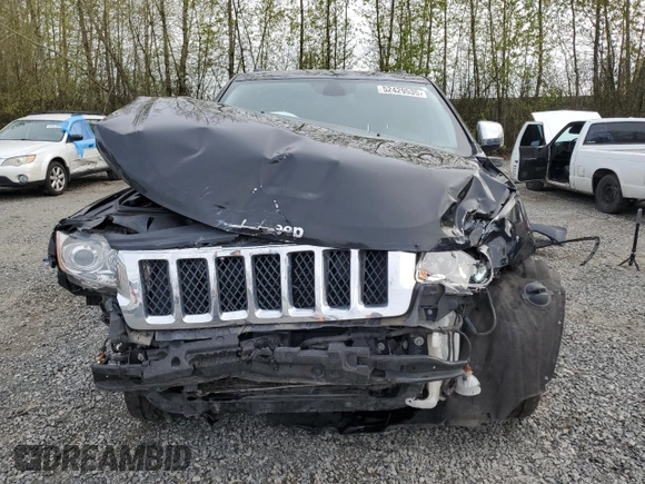 2013 Jeep Grand Cherokee Overland with VIN 1C4RJFCGXDC643802, listed as a Copart auction lot 52429535 with 122,014 mi miles and Salvage Title. Bid and sale history available at carsss.com. Image 5.