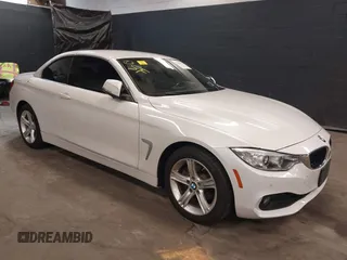 2015 BMW 4 Series 428i xDrive with VIN WBA3T1C52FP821020, listed as a IAAI auction lot 42004707 with 74,951 mi miles and . Bid and sale history available at carsss.com. Image 1.