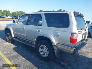 1997 Toyota 4Runner Limited with VIN JT3GN87R3V0043679, listed as a IAAI auction lot 42043029 with 296,834 mi miles. Bid and sale history available at carsss.com. Image 3.