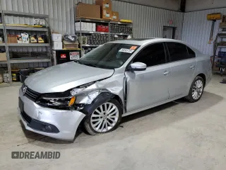 2014 Volkswagen Jetta SEL с VIN 3VWL17AJXEM404421, выставлен на аукционе Copart как лот 58345725 с пробегом 92 416 миль миль и Списание • Salvage title. История ставок и продаж доступна на DreamBid. Изображение 1.