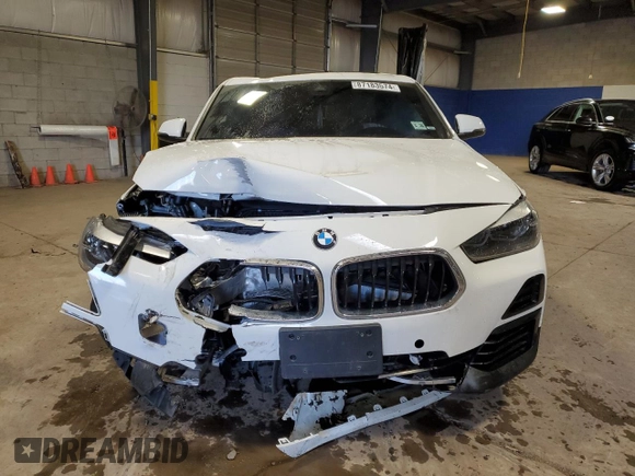 2022 BMW X2 xDrive28i with VIN WBXYJ1C03N5T55985, listed as a Copart auction lot 87183574 with 33,134 mi miles and Salvage Title. Bid and sale history available at carsss.com. Image 5.