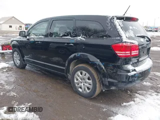 2014 Dodge Journey American Value Pkg with VIN 3C4PDCAB4ET283985, listed as a IAAI auction lot 41617089 with 155,860 mi miles. Bid and sale history available at carsss.com. Image 3.
