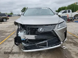 2017 Lexus RX 350 z VIN 2T2BZMCA8HC055917, wystawiony jako Copart lot #57641945 z przebiegiem 114 036 mil mil oraz Szkoda całkowita • Salvage title. Historia ofert i sprzedaży dostępna na DreamBid. Obrazek 5.