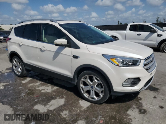 2019 Ford Escape Titanium with VIN 1FMCU9J92KUA55656, listed as a Copart auction lot 52233235 with 57,052 mi miles and Non Repairable. Bid and sale history available at carsss.com. Image 4.