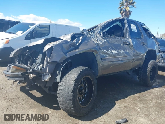 2012 Chevrolet Tahoe LT with VIN 1GNSKBE09CR100385, listed as a IAAI auction lot 41743325 with 185,174 mi miles and . Bid and sale history available at DreamBid. Image 2.