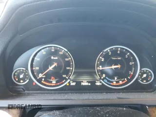 2014 BMW 7 Series 740i with VIN WBAYA6C59ED144122, listed as a Copart auction lot 75059334 with 78,090 mi miles and Salvage Title. Bid and sale history available at carsss.com. Image 9.