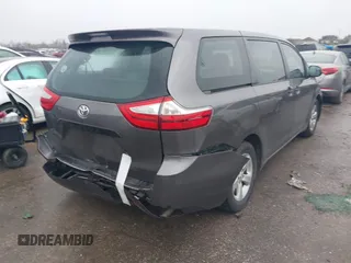 2015 Toyota Sienna L with VIN 5TDZK3DC9FS563593, listed as a IAAI auction lot 41466419 with 136,394 mi miles and . Bid and sale history available at DreamBid. Image 4.