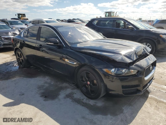 2017 Jaguar XE 25t with VIN SAJAR4BG7HA977736, listed as a Copart auction lot 48751375 with 121,674 mi miles and Salvage Title. Bid and sale history available at carsss.com. Image 4.