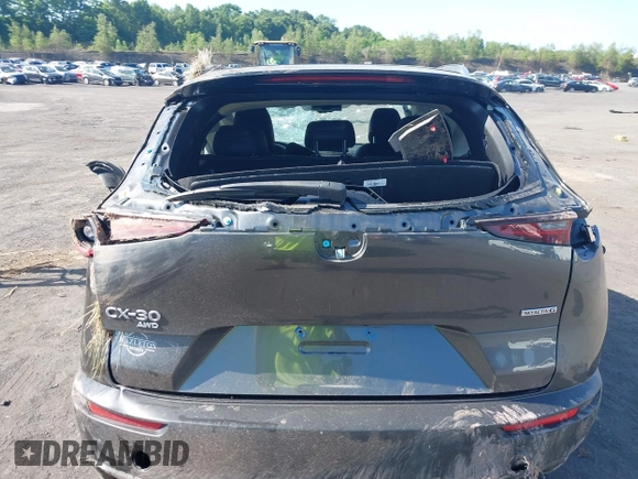 2023 Mazda CX-30 S Carbon Edition with VIN 3MVDMBCM6PM510231, listed as a IAAI auction lot 42579591 with 29,240 mi miles and . Bid and sale history available at DreamBid. Image 16.