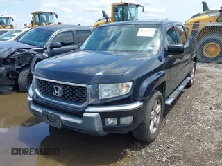 2011 Honda Ridgeline RTL with VIN 5FPYK1F54BB011472, listed as a IAAI auction lot 42112512 with 194,974 mi miles and . Bid and sale history available at DreamBid. Image 17.