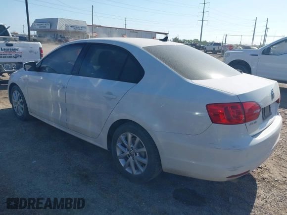 2012 Volkswagen Jetta Sedan SE w/Convenience with VIN 3VWDX7AJ2CM309397, listed as a IAAI auction lot 42020102 with 1 mi miles. Bid and sale history available at carsss.com. Image 3.