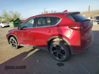 2018 Mazda CX-5 Grand Touring z VIN JM3KFBDMXJ0390680, wystawiony jako Copart lot #51654345 z przebiegiem 67 167 mil mil oraz Szkoda całkowita • Salvage title. Historia ofert i sprzedaży dostępna na DreamBid. Obrazek 2.