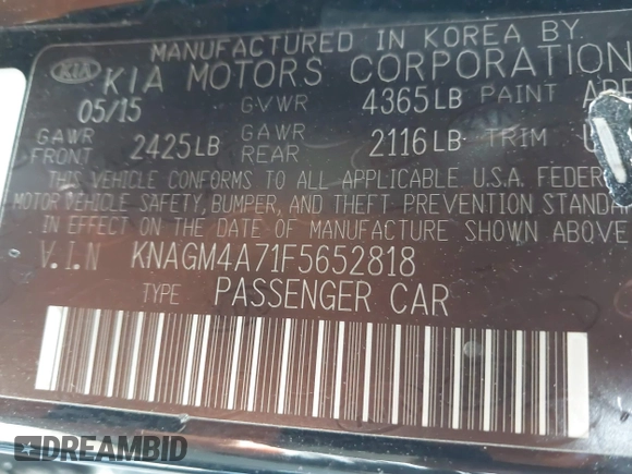 2015 Kia Optima LX with VIN KNAGM4A71F5652818, listed as a IAAI auction lot 41656933 with 251,967 mi miles. Bid and sale history available at carsss.com. Image 9.