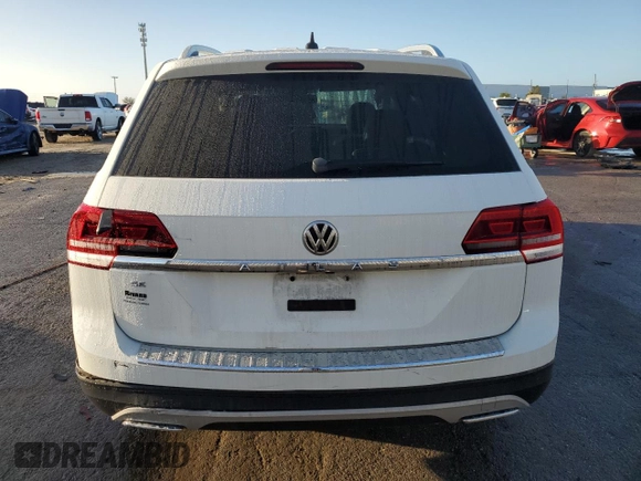 2019 Volkswagen Atlas SE with VIN 1V2DP2CA9KC595931, listed as a Copart auction lot 84701994 with 77,000 mi miles and Salvage title. Bid and sale history available at DreamBid. Image 6.