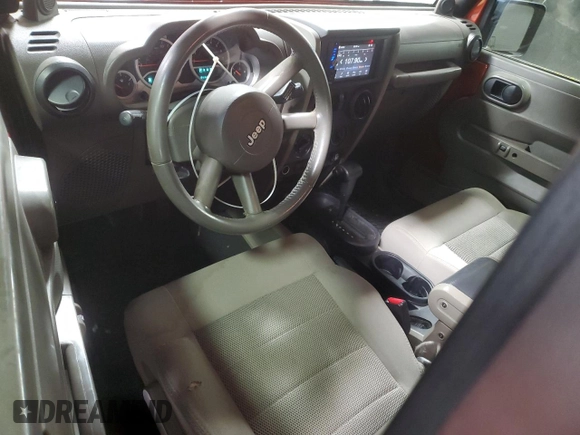 2009 Jeep Wrangler Rubicon with VIN 1J4GA64179L733136, listed as a Copart auction lot 43747805 with 94,899 mi miles and Salvage Title. Bid and sale history available at DreamBid. Image 8.