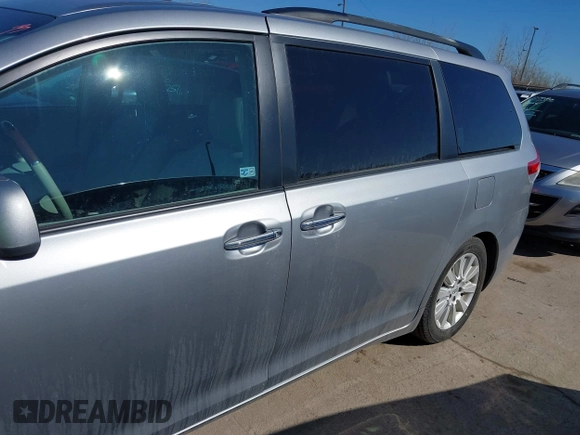 2011 Toyota Sienna XLE AAS with VIN 5TDYK3DC6BS147636, listed as a IAAI auction lot 41759192 with 182,966 mi miles and . Bid and sale history available at DreamBid. Image 14.