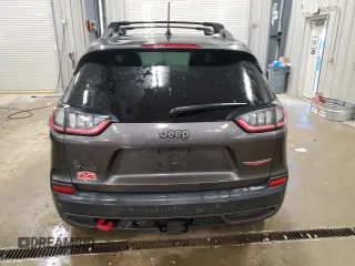 2019 Jeep Cherokee Trailhawk Elite с VIN 1C4PJMBN6KD162156, выставлен на аукционе Copart как лот 83041704 с пробегом 100 616 миль миль и Списание • Salvage title. История ставок и продаж доступна на DreamBid. Изображение 6.