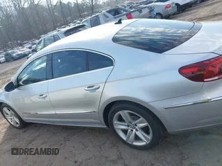 2013 Volkswagen CC Sport with VIN WVWBN7AN3DE553523, listed as a IAAI auction lot 41661320 with 95,085 mi miles and . Bid and sale history available at DreamBid. Image 14.