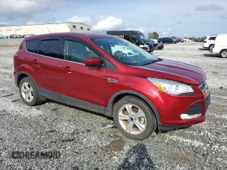 2015 Ford Escape SE with VIN 1FMCU0GX4FUC40055, listed as a Copart auction lot 51298635 with 71,993 mi miles and Salvage Title. Bid and sale history available at DreamBid. Image 4.