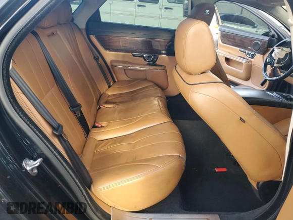 2015 Jaguar XJ Portfolio with VIN SAJWJ2GD2F8V76289, listed as a Copart auction lot 48222815 with 95,420 mi miles and Salvage title. Bid and sale history available at DreamBid. Image 10.