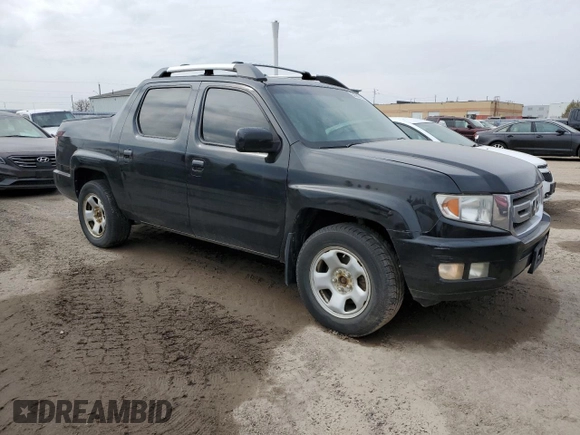 2009 Honda Ridgeline RTL with VIN 2HJYK165X9H002865, listed as a Copart auction lot 52682515 with 260,785 mi miles and Clean Title. Bid and sale history available at carsss.com. Image 4.