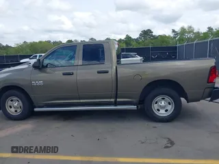 2014 Ram 1500 Tradesman with VIN 1C6RR6FG6ES233212, listed as a IAAI auction lot 41940763 with 131,914 mi miles and . Bid and sale history available at DreamBid. Image 14.