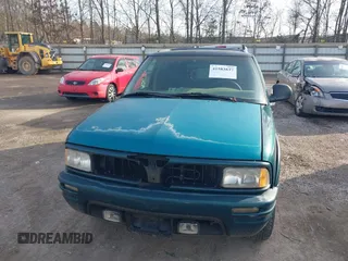 1997 Oldsmobile Bravada z VIN 1GHDT13W9V2705528, wystawiony jako IAAI lot #41583837 z przebiegiem 284 281 mil mil oraz . Historia ofert i sprzedaży dostępna na DreamBid. Obrazek 6.