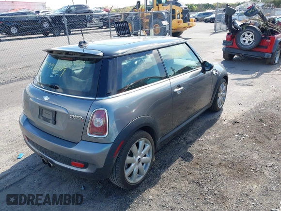 2007 MINI Hardtop S with VIN WMWMF73587TT84728, listed as a IAAI auction lot 41996879 with 145,094 mi miles and . Bid and sale history available at DreamBid. Image 4.
