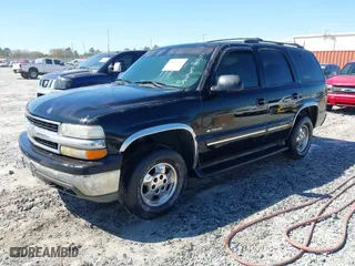 2001 Chevrolet Tahoe LT with VIN 1GNEC13T41J155954, listed as a IAAI auction lot 41810200 with 222,109 mi miles. Bid and sale history available at carsss.com. Image 2.