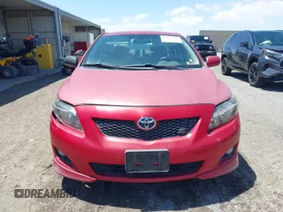 2009 Toyota Corolla with VIN 1NXBU40EX9Z077847, listed as a IAAI auction lot 42188763 with 180,324 mi miles. Bid and sale history available at carsss.com. Image 6.